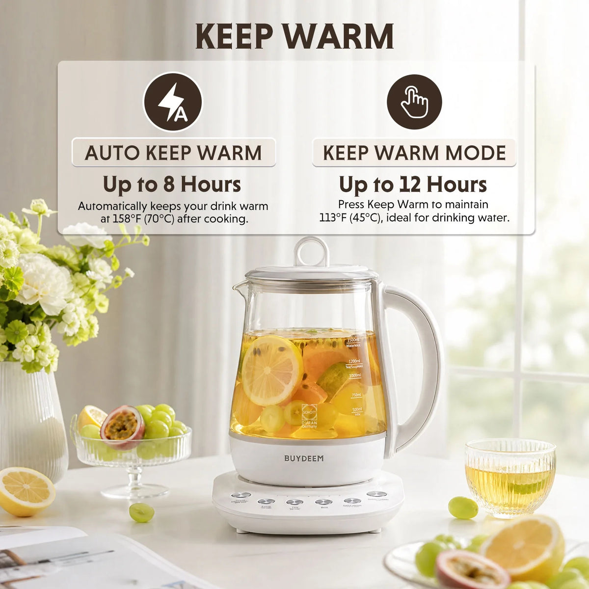 BUYDEEM glass beverage maker on a white electric heating base, filled with lemon and fruit tea, on a kitchen counter with informational text overlays about auto keep warm and keep warm mode.