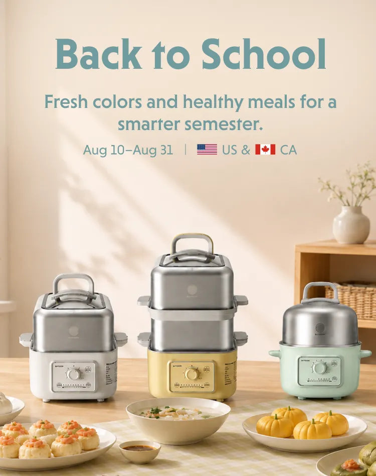Three small electric rice cookers in white, yellow, and mint green are displayed on a table with food bowls and plates in a warm kitchen setting. Large text at the top reads 'Back to School' with promotional copy about fresh colors and healthy meals.