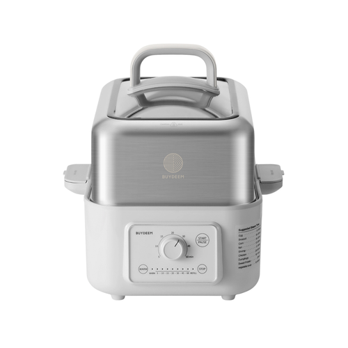 A stainless steel and white steamer pot with a top handle, side release valves, and a front dial control panel, shown on a plain white background.